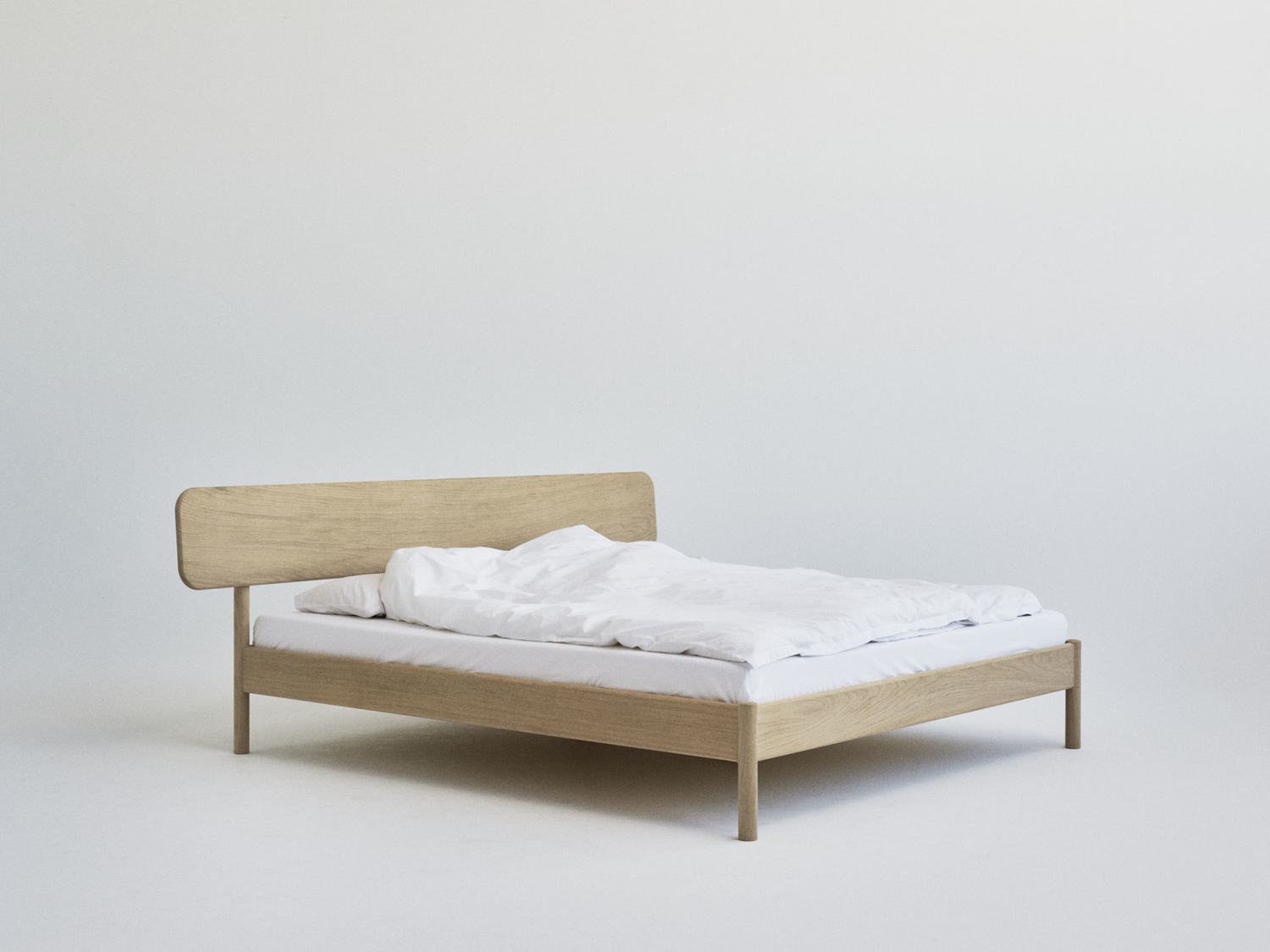 RYE Alken bed frame in soaped solid oak - square view pack shot